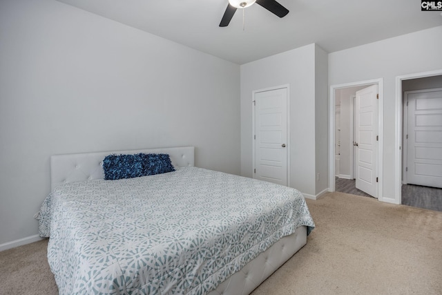 bedroom with ceiling fan and carpet