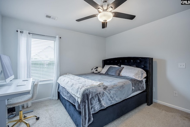 carpeted bedroom with ceiling fan