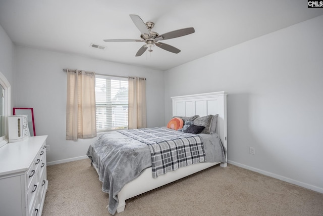 carpeted bedroom featuring ceiling fan