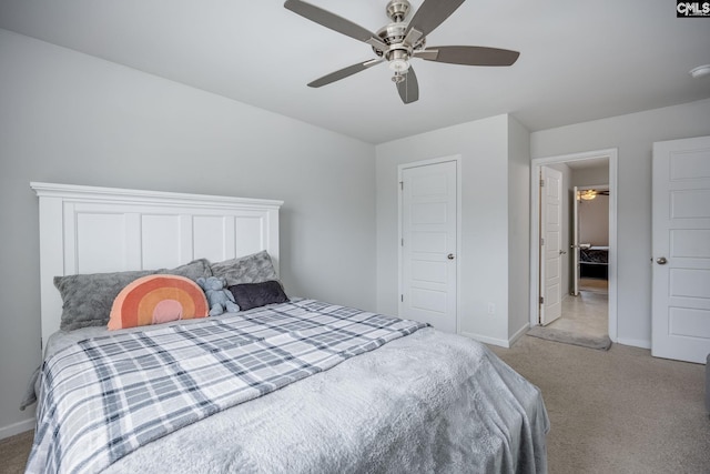 bedroom with light colored carpet and ceiling fan