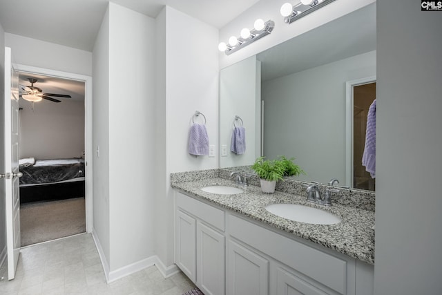 bathroom featuring vanity and ceiling fan