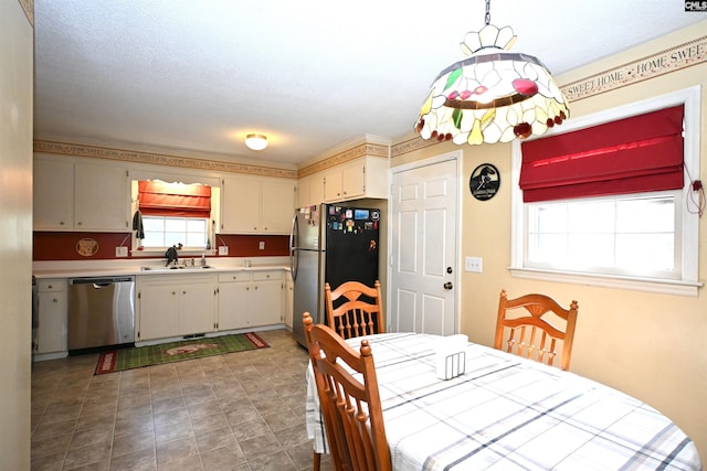 dining room featuring sink