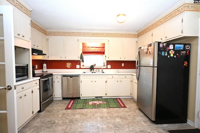 kitchen with white cabinetry, appliances with stainless steel finishes, and sink