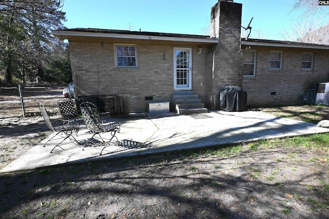 rear view of house featuring a patio area