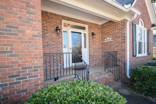 property entrance featuring covered porch