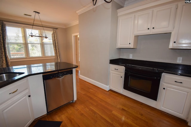 kitchen with decorative light fixtures, light hardwood / wood-style flooring, ornamental molding, dishwasher, and oven