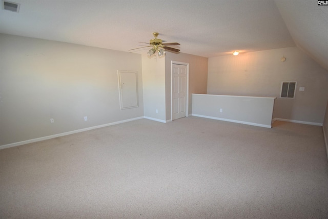 additional living space featuring ceiling fan and light carpet