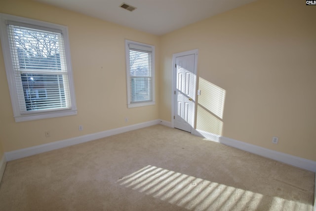 view of carpeted spare room