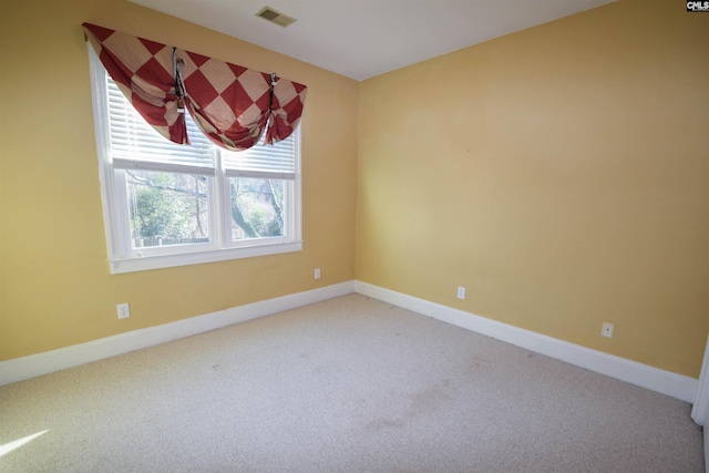 view of carpeted spare room