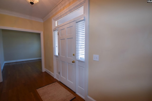 entrance foyer featuring crown molding and dark wood-type flooring