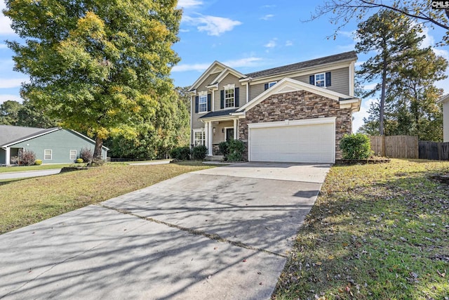 view of front of house featuring a garage and a front lawn