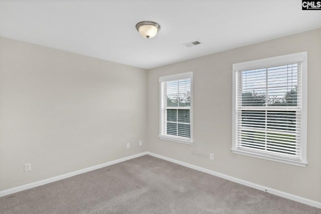 view of carpeted spare room