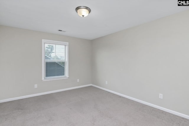 unfurnished room featuring carpet floors