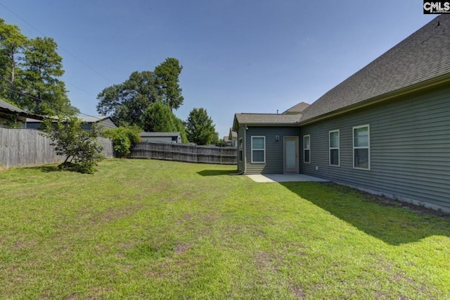 view of yard with a patio area