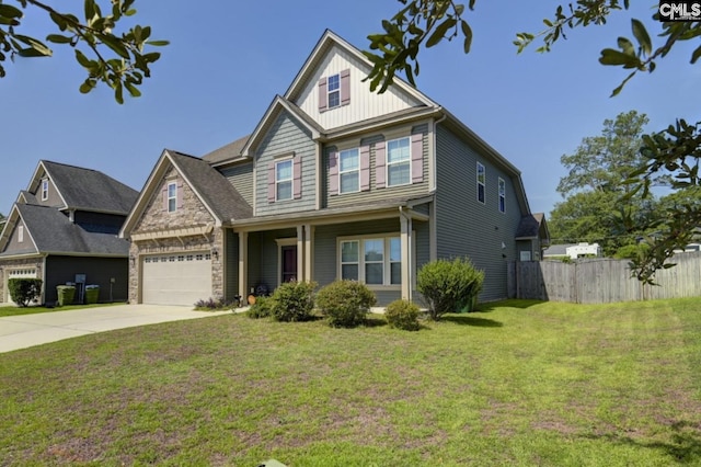 craftsman-style house with a garage and a front lawn