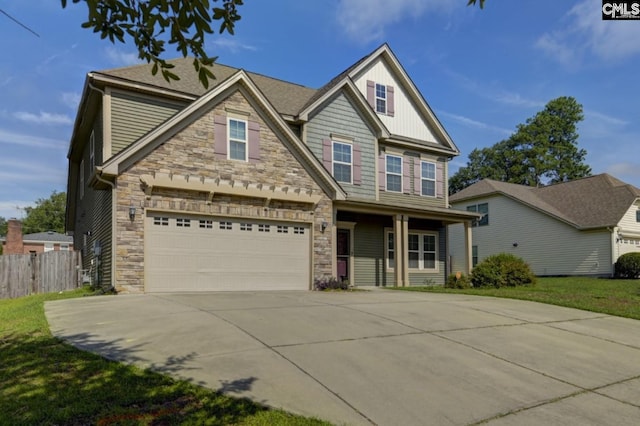 craftsman house with a garage