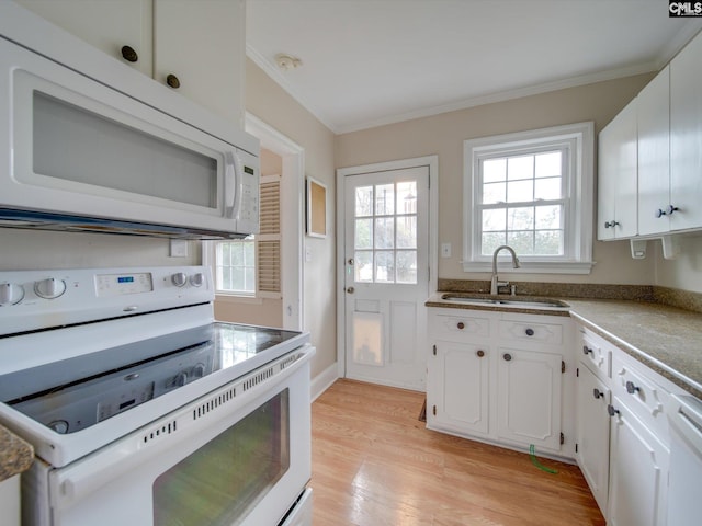 kitchen with sink, white appliances, crown molding, white cabinetry, and light hardwood / wood-style floors