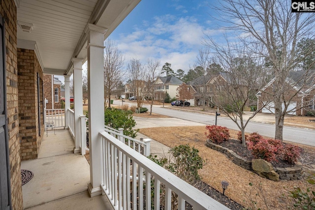 balcony featuring a porch