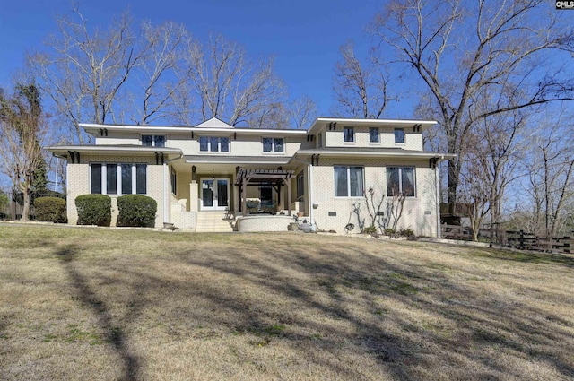 view of front of property with a porch and a front yard