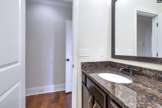 bathroom featuring vanity and hardwood / wood-style floors