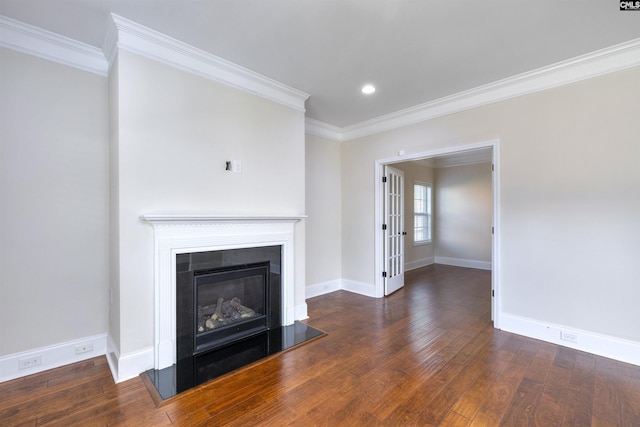 unfurnished living room with dark wood-type flooring and ornamental molding