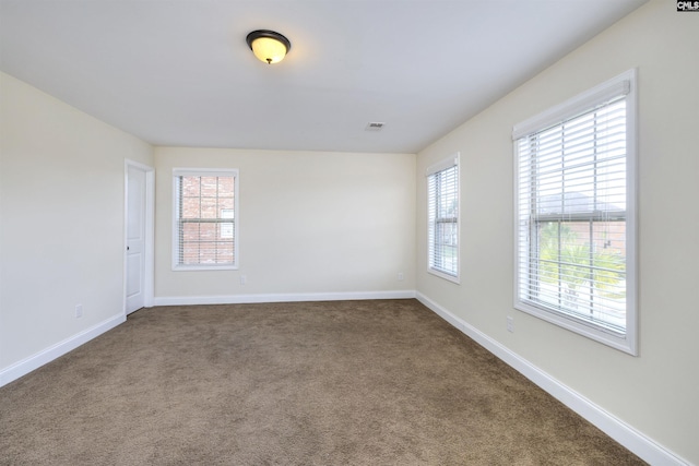 view of carpeted spare room