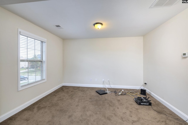 view of carpeted spare room