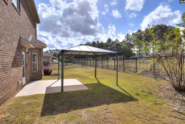 view of yard with a gazebo and a patio area