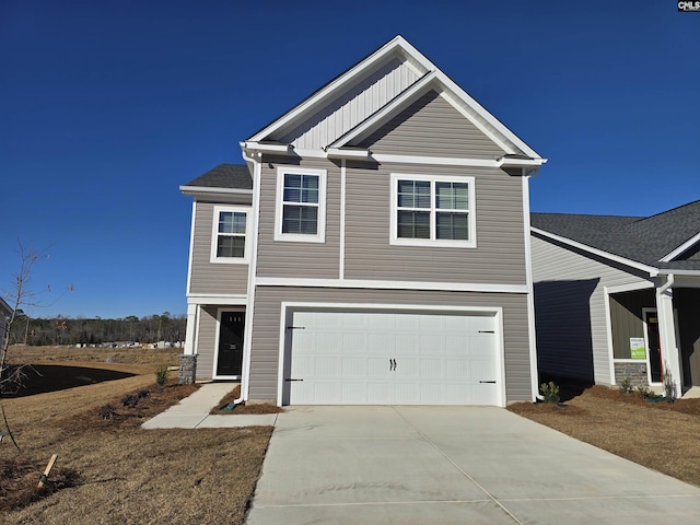 craftsman inspired home with a garage