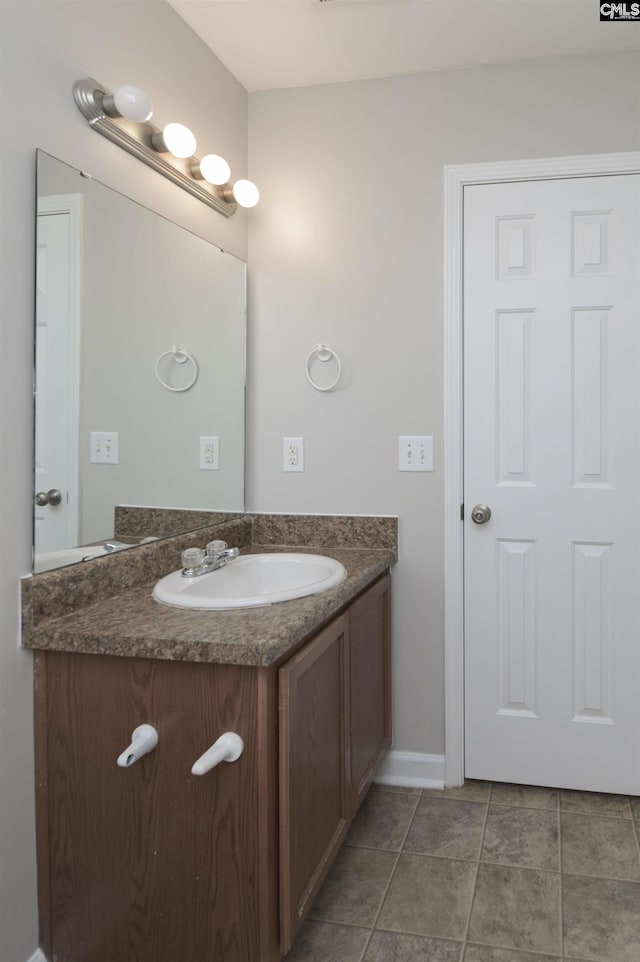 bathroom featuring vanity and tile patterned floors