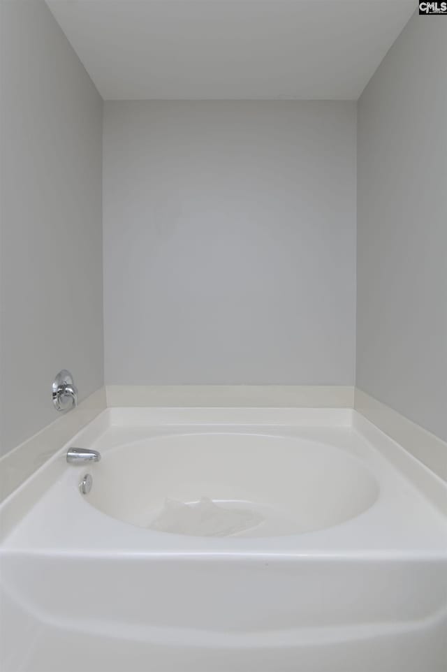 bathroom featuring a tub