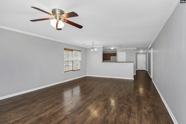 unfurnished living room with dark wood-type flooring, crown molding, and ceiling fan with notable chandelier