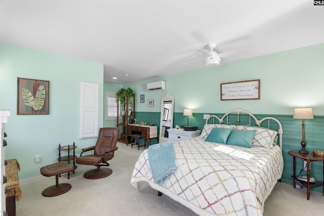 bedroom featuring ceiling fan, an AC wall unit, light carpet, and wooden walls