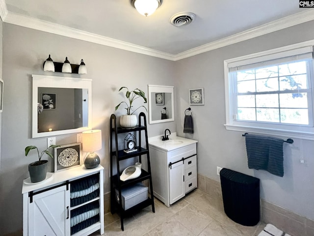 bathroom featuring vanity and crown molding