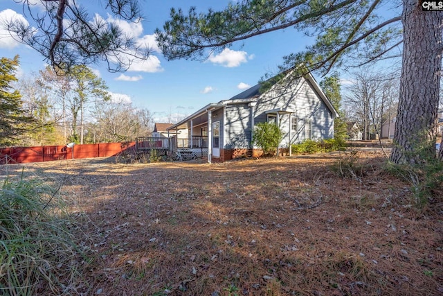 exterior space with a wooden deck