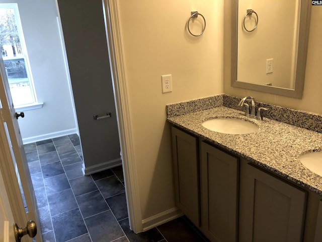 bathroom featuring vanity and tile patterned flooring