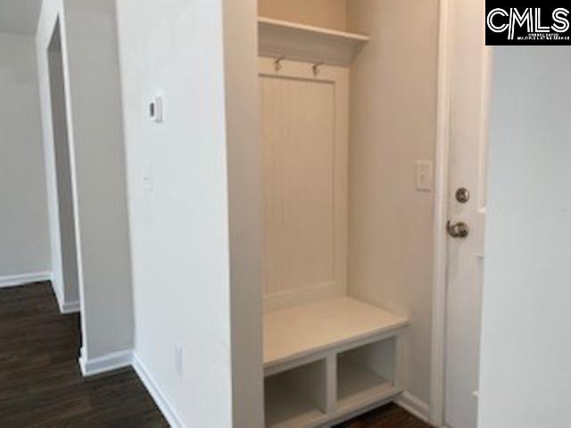 mudroom with dark hardwood / wood-style flooring