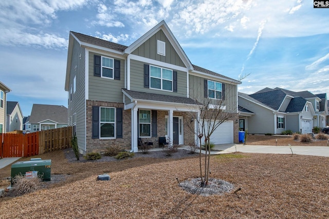 view of front of home with a garage and covered porch