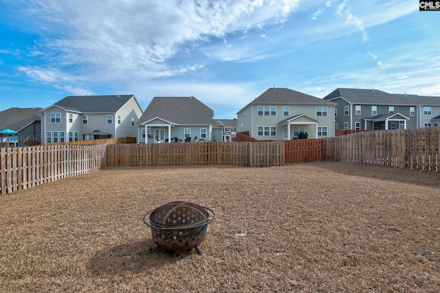 view of yard featuring a fire pit