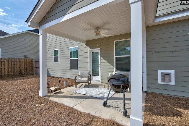 view of patio / terrace featuring ceiling fan and a grill