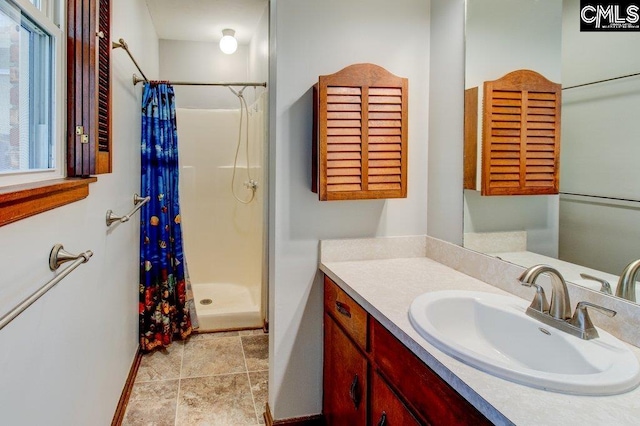 bathroom featuring vanity and walk in shower