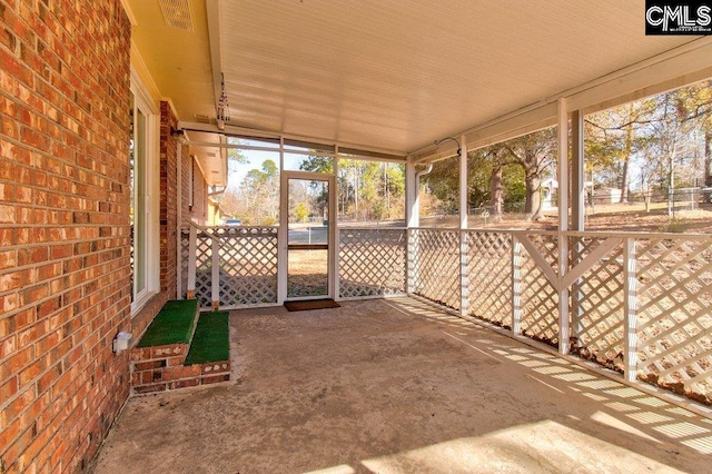 view of unfurnished sunroom