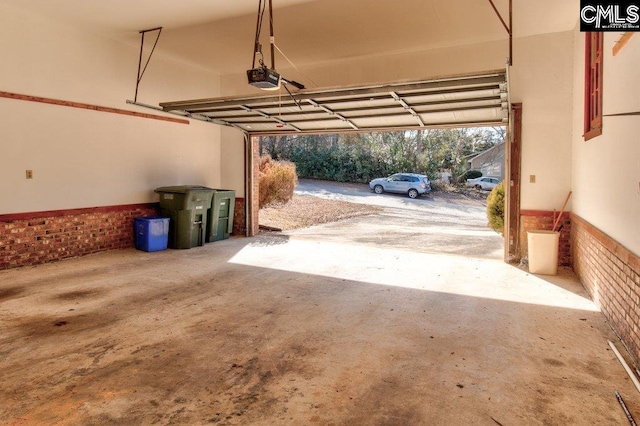 garage featuring a garage door opener