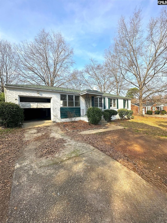 single story home with a garage