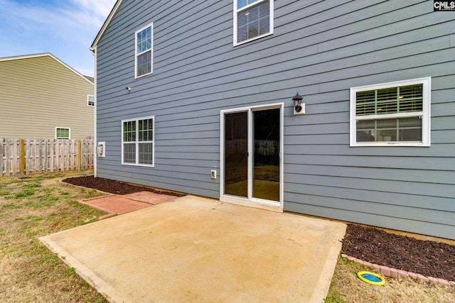 back of house featuring a patio area