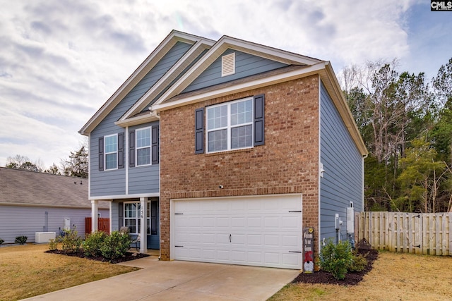 view of front of house featuring a garage and a front yard