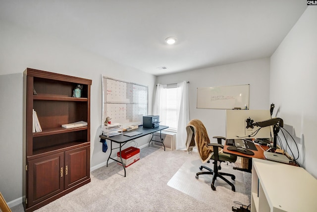 office space featuring light colored carpet