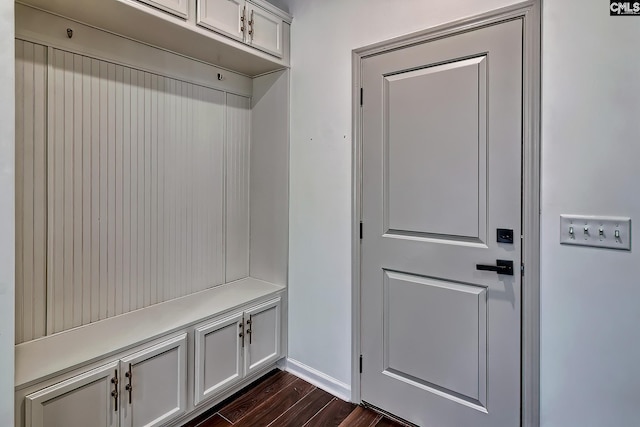 mudroom with dark hardwood / wood-style floors