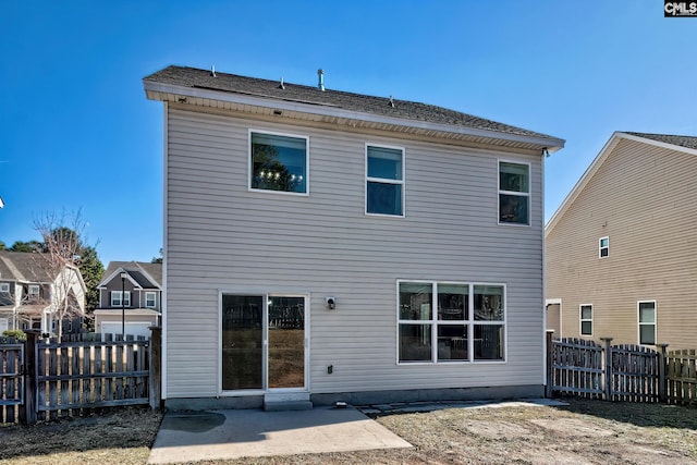 rear view of property with a patio area