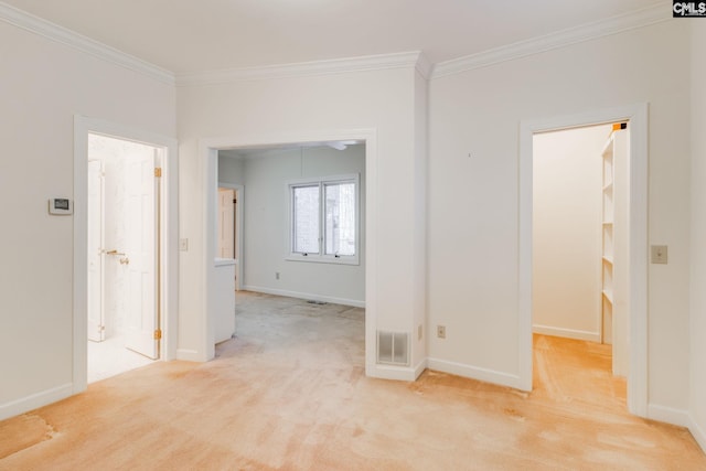 carpeted empty room with ornamental molding